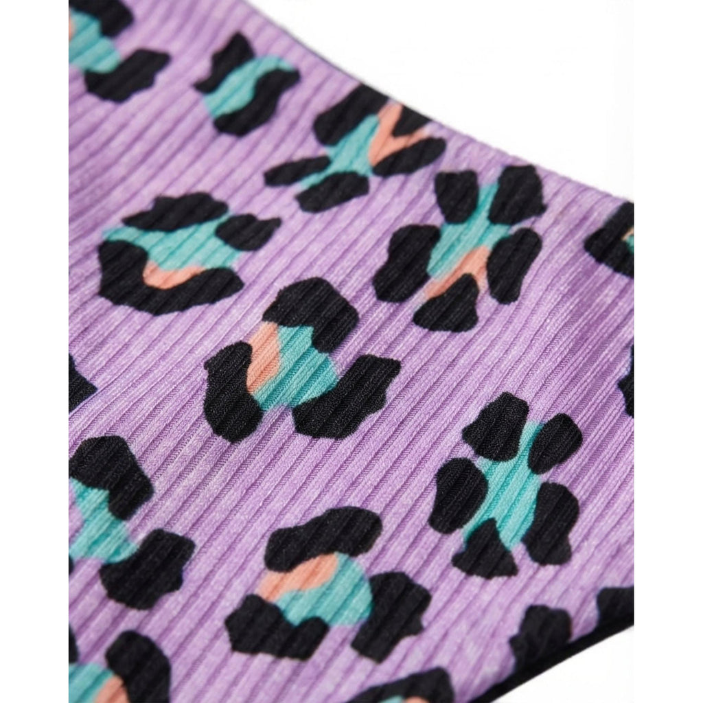 LILA ANIMAL PRINT DELTA WING %